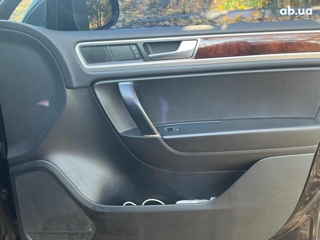 Черный Фольксваген Туарег, объемом двигателя 3 л и пробегом 374 тыс. км за 19990 $, фото 14 на Automoto.ua