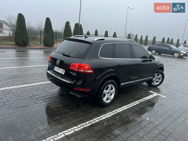 Черный Фольксваген Туарег, объемом двигателя 3 л и пробегом 265 тыс. км за 21500 $, фото 1 на Automoto.ua