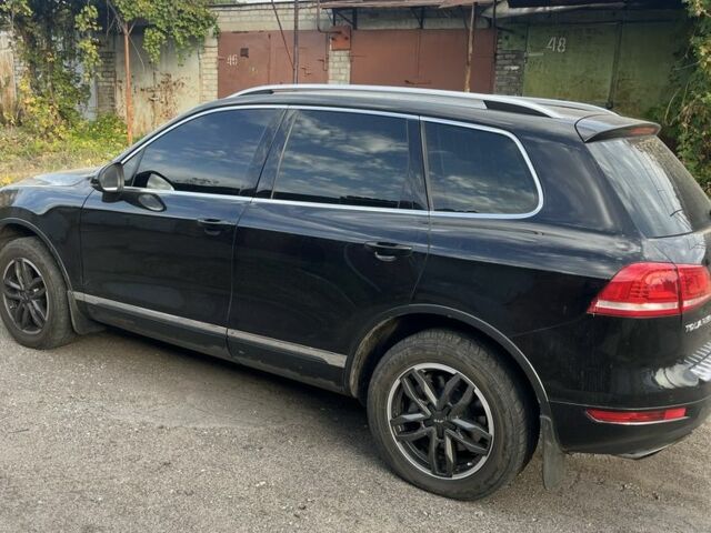 Черный Фольксваген Туарег, объемом двигателя 3 л и пробегом 258 тыс. км за 19000 $, фото 2 на Automoto.ua