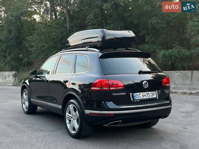 Черный Фольксваген Туарег, объемом двигателя 2.97 л и пробегом 242 тыс. км за 25900 $, фото 2 на Automoto.ua