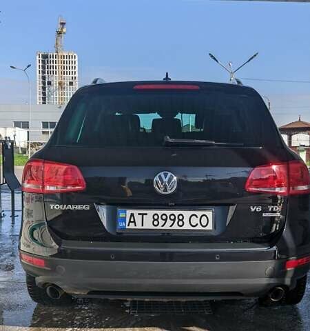 Чорний Фольксваген Туарег, об'ємом двигуна 3 л та пробігом 214 тис. км за 28000 $, фото 1 на Automoto.ua