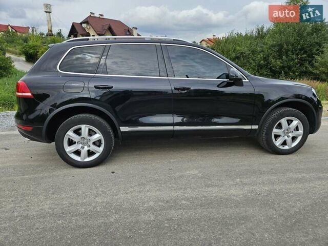 Черный Фольксваген Туарег, объемом двигателя 3 л и пробегом 236 тыс. км за 21600 $, фото 3 на Automoto.ua