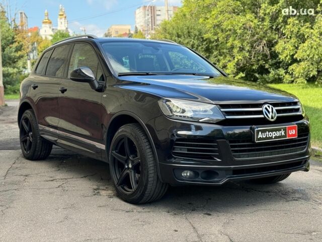 Черный Фольксваген Туарег, объемом двигателя 3 л и пробегом 200 тыс. км за 25790 $, фото 2 на Automoto.ua