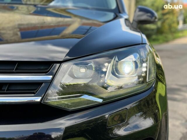 Черный Фольксваген Туарег, объемом двигателя 3 л и пробегом 200 тыс. км за 25790 $, фото 4 на Automoto.ua