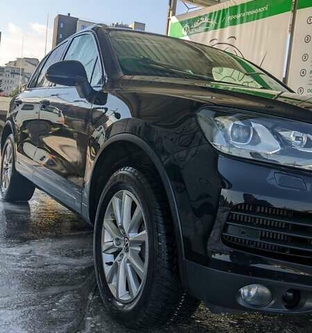 Чорний Фольксваген Туарег, об'ємом двигуна 3 л та пробігом 214 тис. км за 28000 $, фото 14 на Automoto.ua