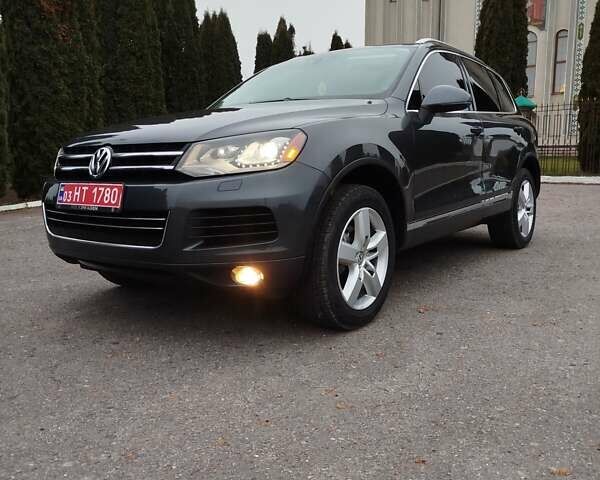 Черный Фольксваген Туарег, объемом двигателя 3 л и пробегом 252 тыс. км за 18600 $, фото 1 на Automoto.ua