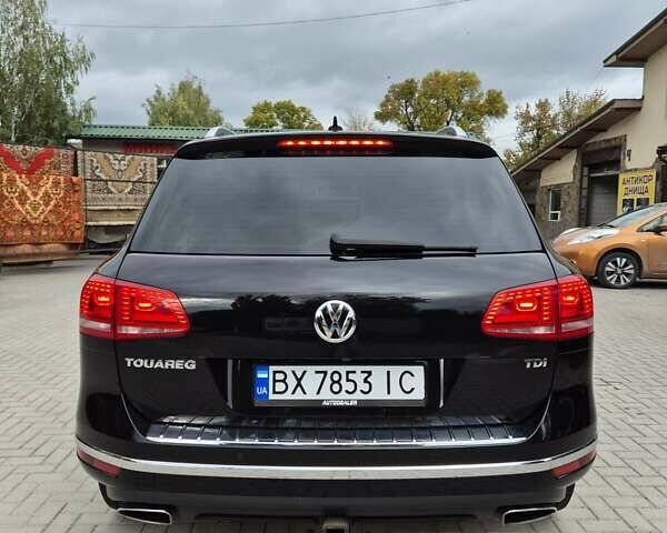 Черный Фольксваген Туарег, объемом двигателя 3 л и пробегом 330 тыс. км за 19999 $, фото 1 на Automoto.ua