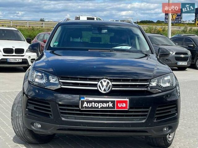 Чорний Фольксваген Туарег, об'ємом двигуна 3 л та пробігом 231 тис. км за 23680 $, фото 1 на Automoto.ua