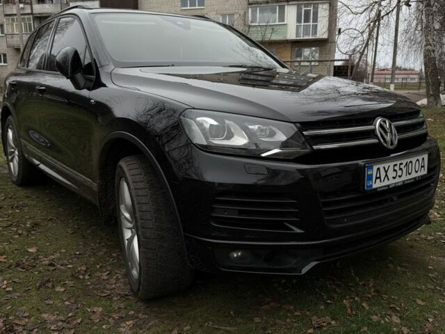 Черный Фольксваген Туарег, объемом двигателя 3 л и пробегом 250 тыс. км за 25000 $, фото 2 на Automoto.ua