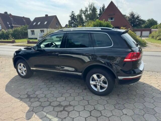 Чорний Фольксваген Туарег, об'ємом двигуна 3 л та пробігом 74 тис. км за 7000 $, фото 4 на Automoto.ua