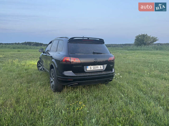 Черный Фольксваген Туарег, объемом двигателя 3 л и пробегом 230 тыс. км за 26000 $, фото 6 на Automoto.ua