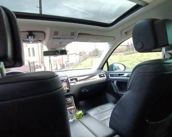 Черный Фольксваген Туарег, объемом двигателя 3 л и пробегом 204 тыс. км за 26500 $, фото 2 на Automoto.ua