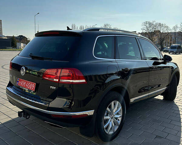 Черный Фольксваген Туарег, объемом двигателя 3 л и пробегом 235 тыс. км за 21500 $, фото 2 на Automoto.ua