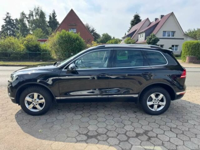 Чорний Фольксваген Туарег, об'ємом двигуна 3 л та пробігом 74 тис. км за 7000 $, фото 3 на Automoto.ua