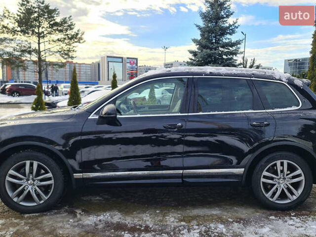 Чорний Фольксваген Туарег, об'ємом двигуна 3 л та пробігом 185 тис. км за 32999 $, фото 1 на Automoto.ua