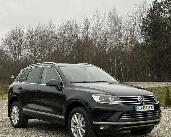 Черный Фольксваген Туарег, объемом двигателя 2.97 л и пробегом 165 тыс. км за 25200 $, фото 1 на Automoto.ua