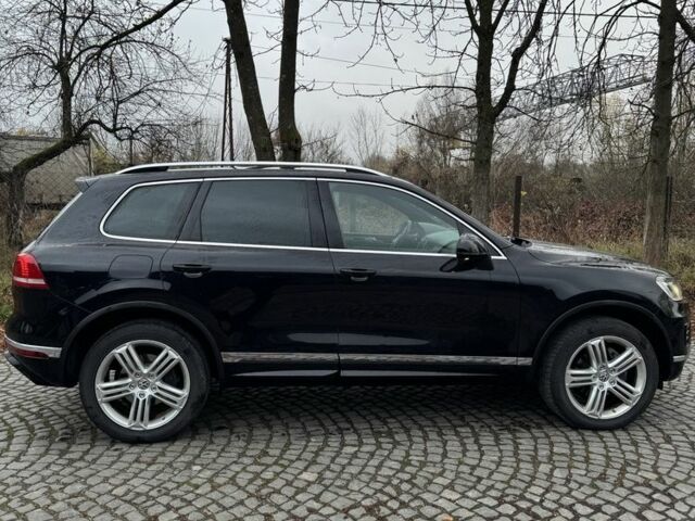 Чорний Фольксваген Туарег, об'ємом двигуна 3 л та пробігом 275 тис. км за 26000 $, фото 2 на Automoto.ua