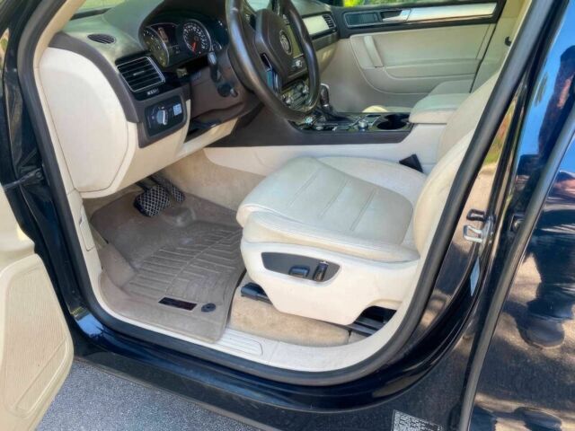 Черный Фольксваген Туарег, объемом двигателя 3 л и пробегом 74 тыс. км за 4200 $, фото 7 на Automoto.ua