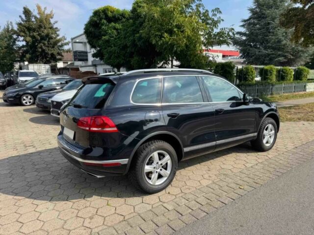 Чорний Фольксваген Туарег, об'ємом двигуна 3 л та пробігом 74 тис. км за 7000 $, фото 6 на Automoto.ua