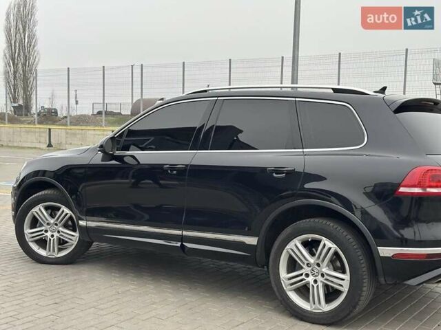 Чорний Фольксваген Туарег, об'ємом двигуна 3 л та пробігом 246 тис. км за 27700 $, фото 4 на Automoto.ua