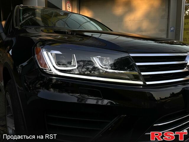 Черный Фольксваген Туарег, объемом двигателя 3.6 л и пробегом 227 тыс. км за 19000 $, фото 2 на Automoto.ua