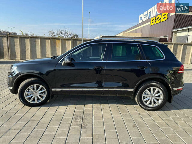 Черный Фольксваген Туарег, объемом двигателя 3 л и пробегом 235 тыс. км за 21500 $, фото 6 на Automoto.ua