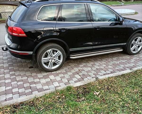 Черный Фольксваген Туарег, объемом двигателя 3 л и пробегом 204 тыс. км за 26500 $, фото 20 на Automoto.ua