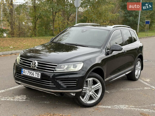 Черный Фольксваген Туарег, объемом двигателя 3 л и пробегом 237 тыс. км за 24900 $, фото 1 на Automoto.ua