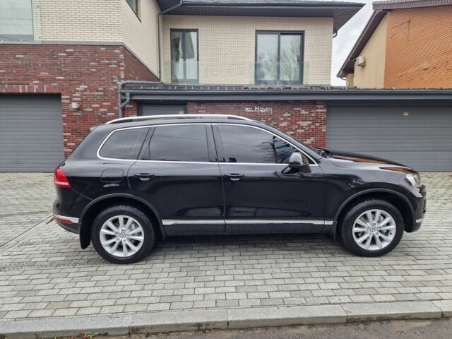 Чорний Фольксваген Туарег, об'ємом двигуна 3 л та пробігом 242 тис. км за 23000 $, фото 4 на Automoto.ua