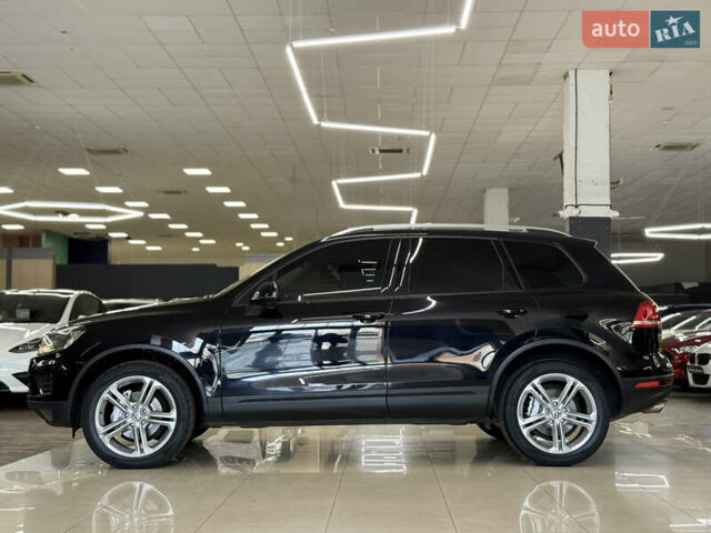 Черный Фольксваген Туарег, объемом двигателя 3 л и пробегом 258 тыс. км за 24799 $, фото 1 на Automoto.ua