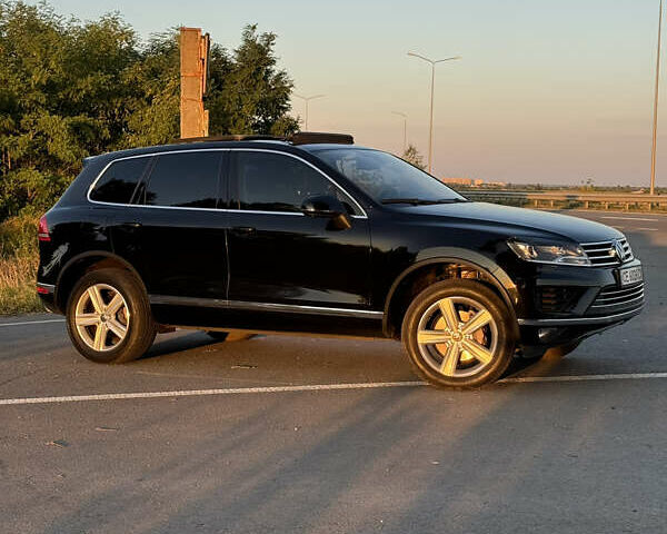 Черный Фольксваген Туарег, объемом двигателя 3 л и пробегом 219 тыс. км за 26900 $, фото 2 на Automoto.ua