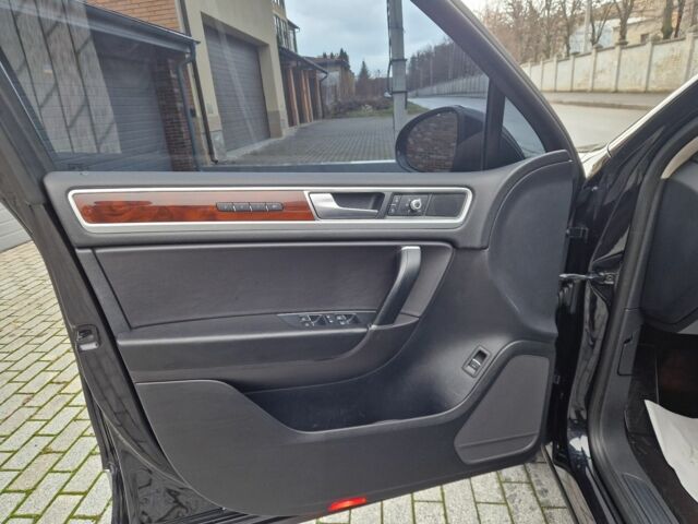 Чорний Фольксваген Туарег, об'ємом двигуна 3 л та пробігом 242 тис. км за 23000 $, фото 12 на Automoto.ua