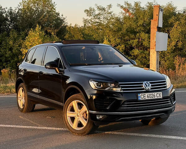 Черный Фольксваген Туарег, объемом двигателя 3 л и пробегом 219 тыс. км за 26900 $, фото 1 на Automoto.ua