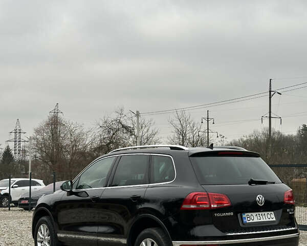 Черный Фольксваген Туарег, объемом двигателя 2.97 л и пробегом 165 тыс. км за 25200 $, фото 3 на Automoto.ua