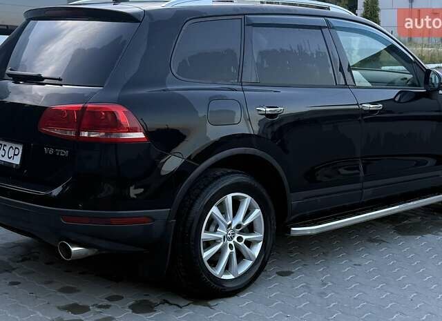 Черный Фольксваген Туарег, объемом двигателя 2.97 л и пробегом 285 тыс. км за 23500 $, фото 2 на Automoto.ua