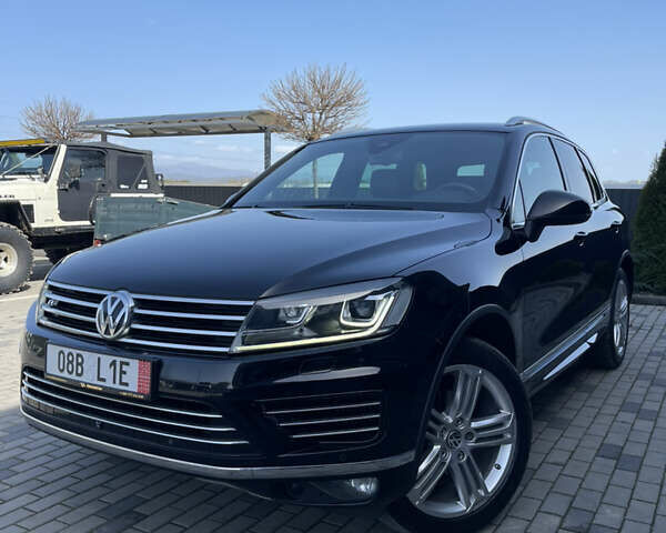 Черный Фольксваген Туарег, объемом двигателя 3 л и пробегом 266 тыс. км за 27990 $, фото 1 на Automoto.ua