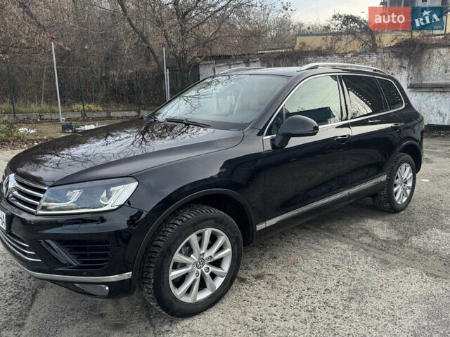Черный Фольксваген Туарег, объемом двигателя 2.97 л и пробегом 268 тыс. км за 24300 $, фото 1 на Automoto.ua