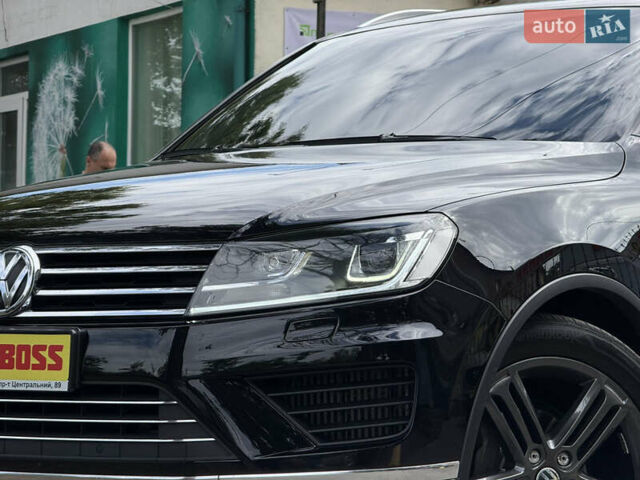 Черный Фольксваген Туарег, объемом двигателя 3 л и пробегом 212 тыс. км за 28999 $, фото 2 на Automoto.ua