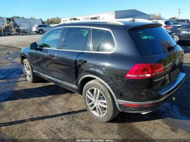 Черный Фольксваген Туарег, объемом двигателя 3 л и пробегом 170 тыс. км за 3000 $, фото 2 на Automoto.ua