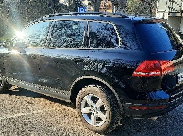 Черный Фольксваген Туарег, объемом двигателя 3 л и пробегом 197 тыс. км за 9300 $, фото 4 на Automoto.ua