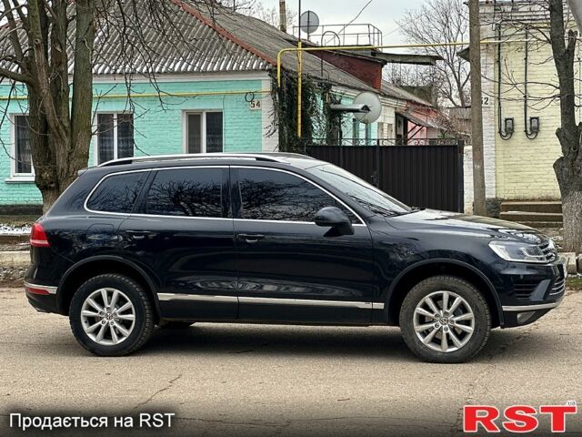 Чорний Фольксваген Туарег, об'ємом двигуна 3 л та пробігом 212 тис. км за 30500 $, фото 3 на Automoto.ua