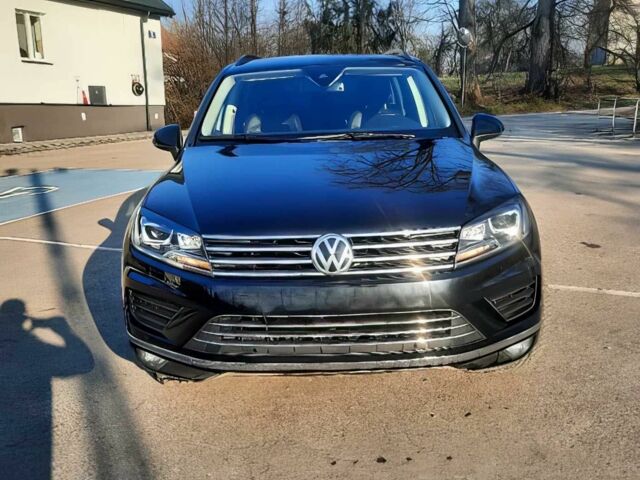 Черный Фольксваген Туарег, объемом двигателя 3 л и пробегом 76 тыс. км за 9300 $, фото 1 на Automoto.ua