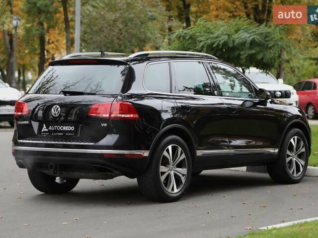 Черный Фольксваген Туарег, объемом двигателя 3.6 л и пробегом 104 тыс. км за 19900 $, фото 3 на Automoto.ua