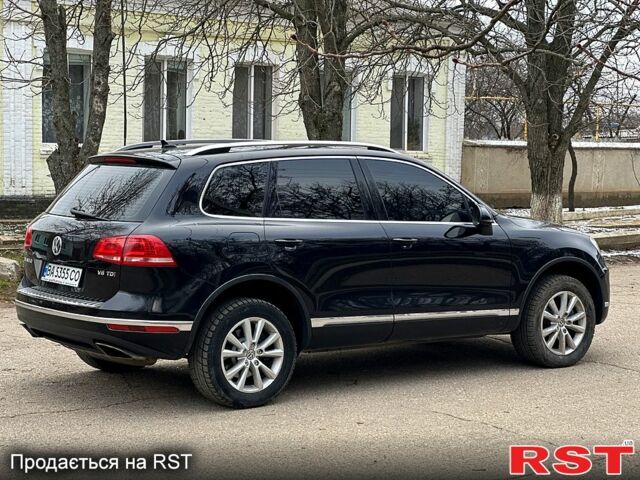 Чорний Фольксваген Туарег, об'ємом двигуна 3 л та пробігом 212 тис. км за 30500 $, фото 4 на Automoto.ua