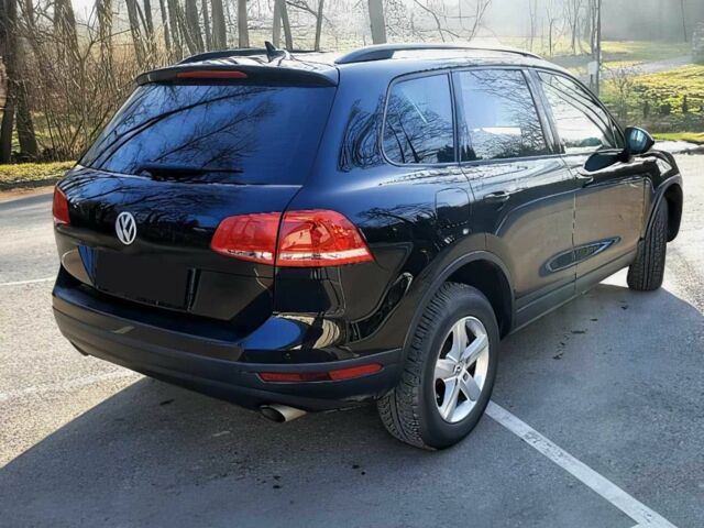 Черный Фольксваген Туарег, объемом двигателя 3 л и пробегом 76 тыс. км за 5600 $, фото 4 на Automoto.ua