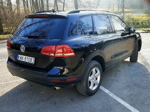 Черный Фольксваген Туарег, объемом двигателя 3 л и пробегом 197 тыс. км за 9300 $, фото 3 на Automoto.ua