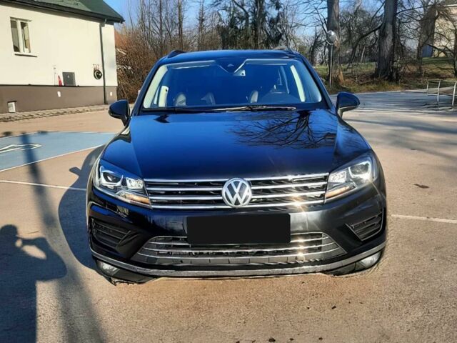 Черный Фольксваген Туарег, объемом двигателя 3 л и пробегом 76 тыс. км за 5600 $, фото 1 на Automoto.ua