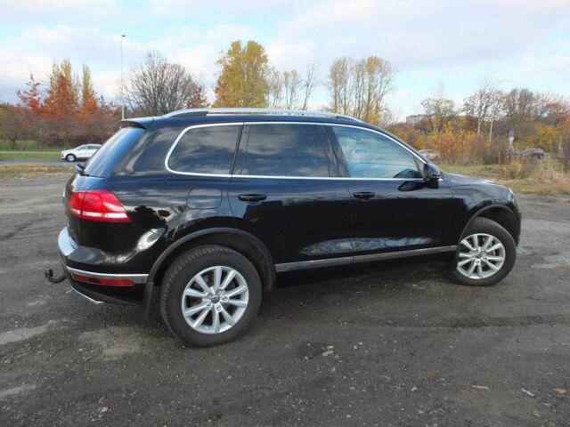 Чорний Фольксваген Туарег, об'ємом двигуна 3 л та пробігом 176 тис. км за 21600 $, фото 2 на Automoto.ua