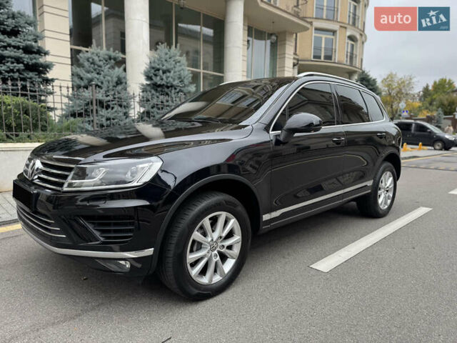Черный Фольксваген Туарег, объемом двигателя 3 л и пробегом 159 тыс. км за 27900 $, фото 1 на Automoto.ua