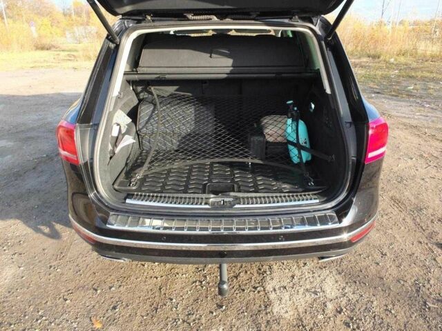 Чорний Фольксваген Туарег, об'ємом двигуна 3 л та пробігом 176 тис. км за 21600 $, фото 4 на Automoto.ua